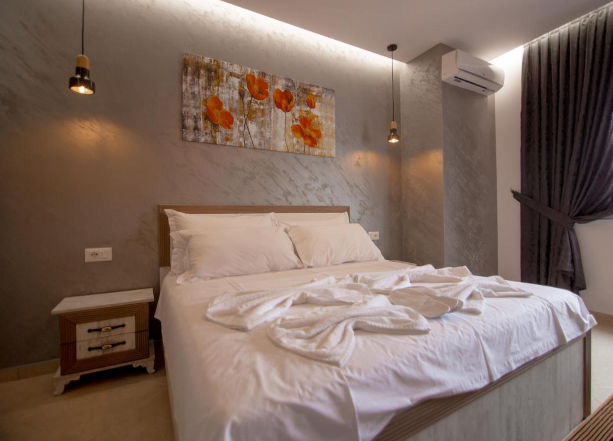 Ajilin Hotel Rooms Корча Екстериор снимка