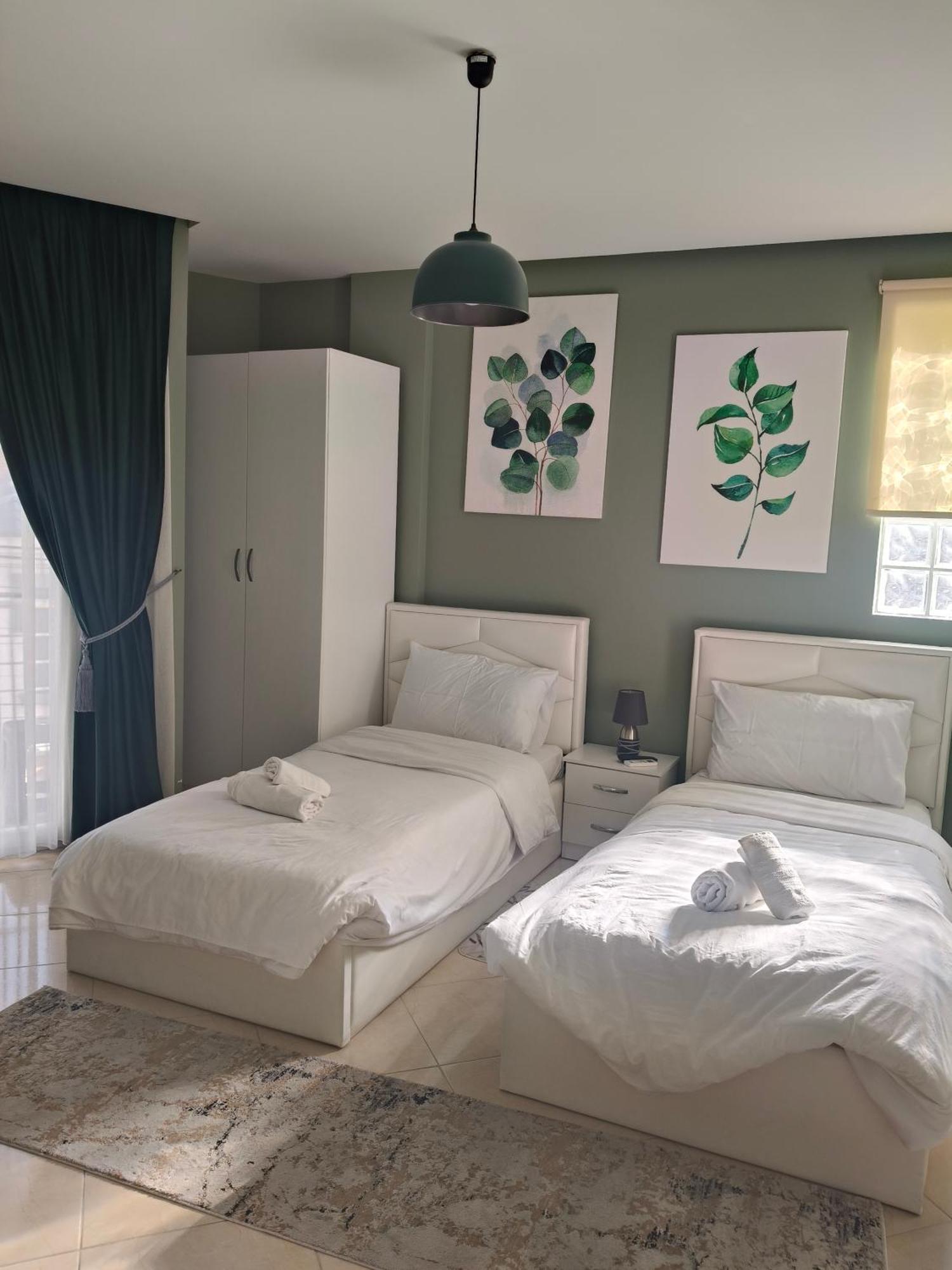 Ajilin Hotel Rooms Корча Стая снимка